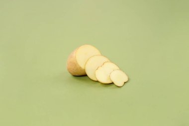 Washed potatoes, organic potato isolated on white background. Young potatoes. Peel potatoes.Harvesting collection. organic, freshly dug potatoes. Vegan. Vegetables.Potato slices.