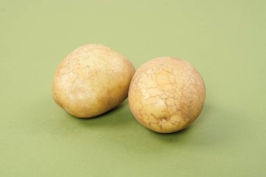 Washed potatoes, organic potato isolated on white background. Young potatoes. Peel potatoes.Harvesting collection. organic, freshly dug potatoes. Vegan. Vegetables.Potato slices.