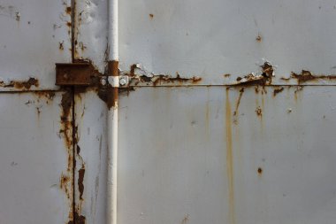 Paslı metal kapılar. Pas dokusu, eski paslı metal yüzey. Geçmişi. Yakın plan.