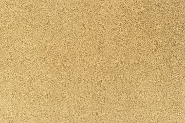 Dekoratif alçı dokusu rahatlatıcı. Bej alçı. Yakın plan..