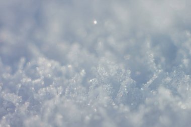Soyut kış geçmişi. Kar kristalleri. Alanın küçük derinliği.