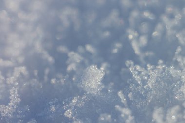 Soyut kış geçmişi. Kar kristalleri. Alanın küçük derinliği.