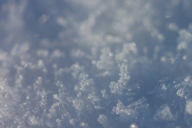 Soyut kış geçmişi. Kar kristalleri. Alanın küçük derinliği.