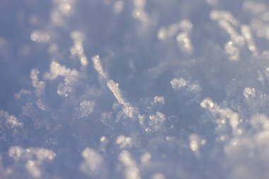 Soyut kış geçmişi. Kar kristalleri. Alanın küçük derinliği.