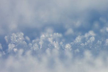 Soyut kış geçmişi. Kar kristalleri. Alanın küçük derinliği.