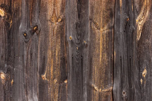 stock image Wooden texture with resinous knots.. The wall of old wooden boards. Close-up, Background