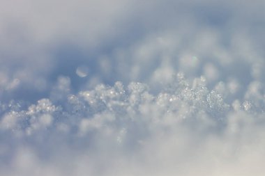 Soyut kış geçmişi. Kar kristalleri. Alanın küçük derinliği.