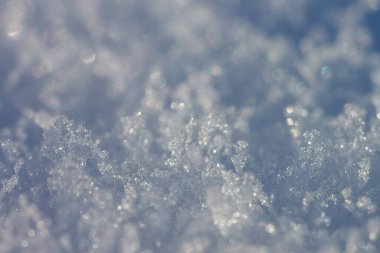 Soyut kış geçmişi. Kar kristalleri. Alanın küçük derinliği.