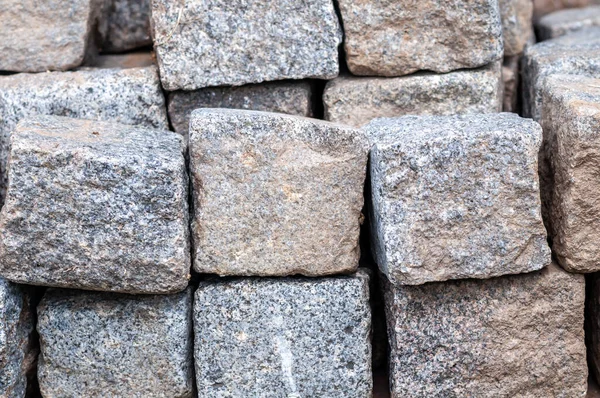 stock image Hard stone cubes stacked on top of each other in a pile