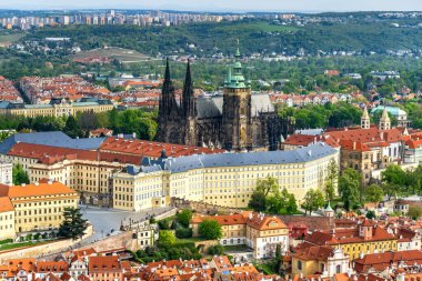 Prague, Czech Republic - April 14, 2023: Prague Castle, seat of the Czech President with a panorama of old houses in the city center.