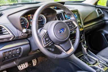 Brno,Czech Republic - June 20, 2024: Interior of a Subaru brand car, view of dial with buttons and dashboard. clipart