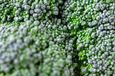 Brokoli deseni. Makro fotoğraf yeşil brokoli dokusu. Taze yeşil brokoli sebzesi. Diyet ve sağlıklı yiyecekler için sebzeler. Organik yiyecekler