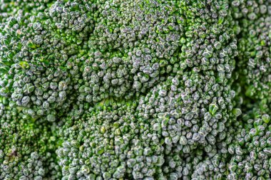 Brokoli deseni. Makro fotoğraf yeşil brokoli dokusu. Taze yeşil brokoli sebzesi. Diyet ve sağlıklı yiyecekler için sebzeler. Organik yiyecekler