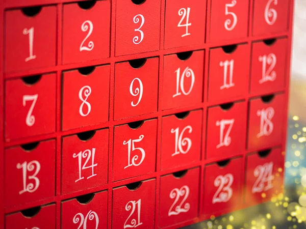 Christmas Advent Calendar. Christmas composition with red advent calendar, Christmas deco