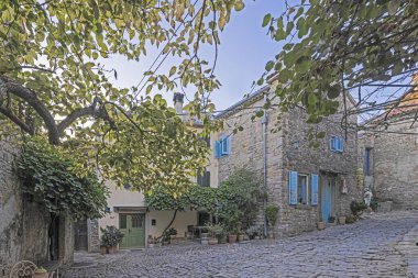 Picture from the historic town of Groznjan in Istria with idyllic cobbled streets and buildings made of natural stone during the day