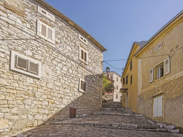 Picture from the historic town of Groznjan in Istria with idyllic cobbled streets and buildings made of natural stone during the day