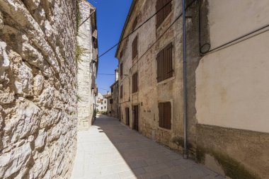 Picture from the historic town of Groznjan in Istria with idyllic cobbled streets and buildings made of natural stone during the day