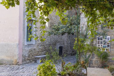 Picture from the historic town of Groznjan in Istria with idyllic cobbled streets and buildings made of natural stone during the day