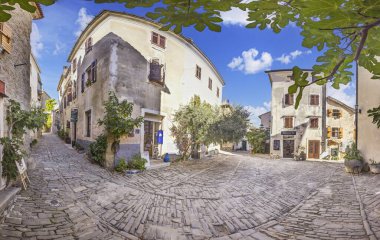 Picture from the historic town of Groznjan in Istria with idyllic cobbled streets and buildings made of natural stone during the day