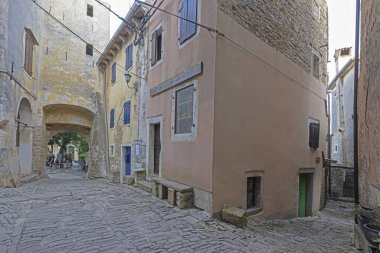 Picture from the historic town of Groznjan in Istria with idyllic cobbled streets and buildings made of natural stone during the day