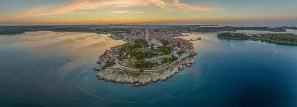 Drone image of the historic Croatian coastal town of Rovinj during sunrise in summer