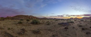 Panoramic picture of Damaraland in Namibia during sunset in summer clipart
