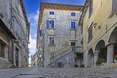 Picture from the historic town of Groznjan in Istria with idyllic cobbled streets and buildings made of natural stone during the day