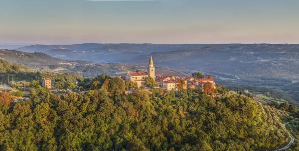 stock image Drone panorama over the historic artists' town of Groznjan in central Istria at sunset in summer