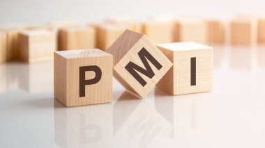 word PMI made with wood building blocks, background may have blur effect clipart