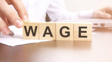 Kelime WAGE ahşap yapı taşları, stok imajı ile yapılmış. arkaplan bulanık etki gösterebilir
