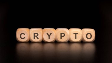 Büyüleyici ve ilgi çekici bir görüntü kripto para birimi, ahşap bloklar ile CRYPTO açıkça yazılıyor