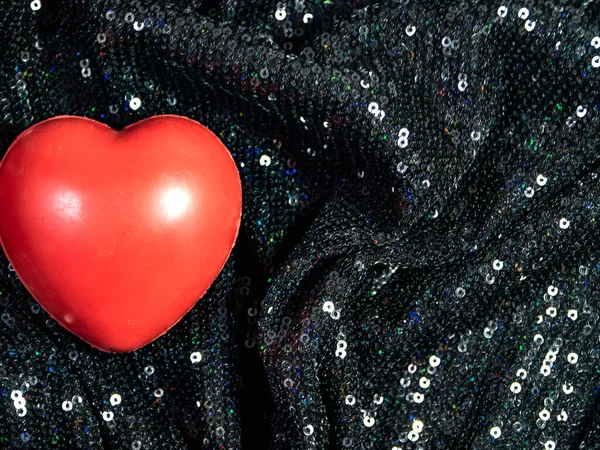 red heart on shiny black matter, St Valentine\'s day, love, mother day, celebration, anniversary