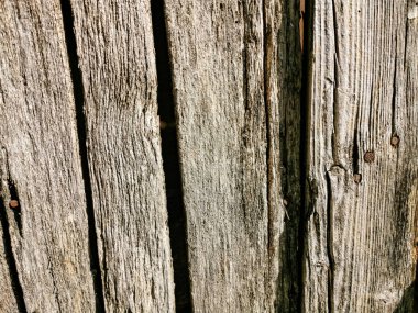 çok eski ahşap yüzey, arka plan, arka plan. Yazı için eski ahşap bir çitin önü..