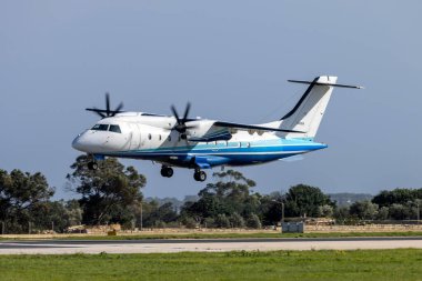 Luqa, Malta - January 17, 2023: USA Air Force Dornier C-146A Wolfhound (REG: 95-3058) landing runway 31 on a sunny winter afternoon.