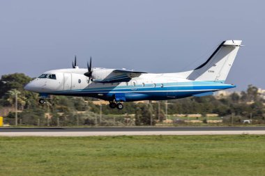 Luqa, Malta - January 17, 2023: USA Air Force Dornier C-146A Wolfhound (REG: 95-3058) landing runway 31 on a sunny winter afternoon.