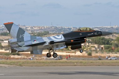Luqa, Malta September 24, 2005: Royal Dutch Air Force General Dynamics (Fokker) F-16AM Fighting Falcon (REG: J-055) in special colors starting its aerial display.