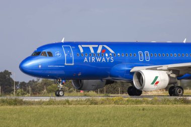 Luqa, Malta - April 3, 2023: ITA Airways Airbus A320-216 (Reg.: EI-DTB) returning to Rome Fiumicino airport. clipart