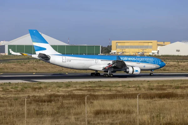 stock image Luqa, Malta - May 29, 2023: Aerolineas Argentinas Airbus A330-202 (Reg.: LV-GIF) landing directly from Buenos Aires for another cargo only flight.