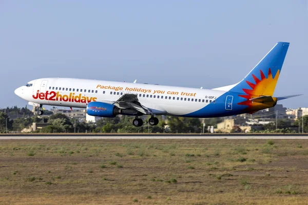 stock image Luqa, Malta - July 31, 2023: Jet2 Holidays Boeing 737-804 (REG: G-GDFJ) arriving as flight LS1519 from London Stansted airport.