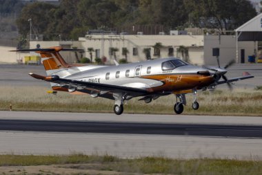 Luqa, Malta - April 21, 2024: Hans Jet Pilatus PC-12 NGX (REG: EJ-PNGX) arriving from Olbia Costa Smeralda Airport in Italy. clipart