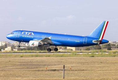 Luqa, Malta - July 3, 2024: ITA Airways Airbus A320-216 (Reg.: EI-DTO) arriving from Rome, Italy. clipart