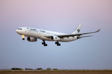 Luqa, Malta - July 23, 2024: Saudi Arabian Airlines (Wamos Air) Airbus A330-343 (REG: EC-NOG) in a new color scheme. clipart