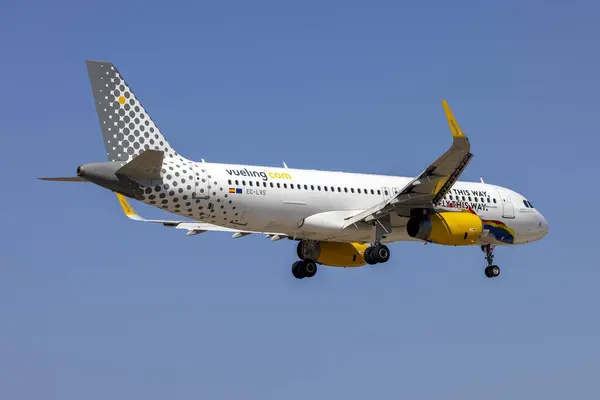 stock image Luqa, Malta - August 11, 2024: Vueling Airlines Airbus A320-232 (REG: EC-LVS) in BORN THIS WAY - FLY THIS WAY special livery from Bilbao to Malta landing as flight VY3290.