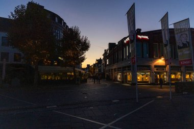 Heerlen, Netherlands - October 26, 2024: A view of the center of the city in the late evening. clipart