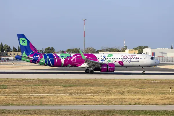 Luqa, Malta - 15 Haziran 2025: Wizz Air Malta Airbus A321-271NX (REG: 9H-WNM) in the special 