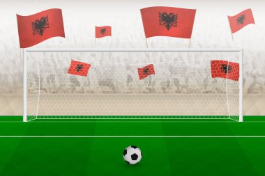 Arnavutluk futbol takımı taraftarları stadyumda bayrak sallıyor, futbol maçında penaltı konsepti.