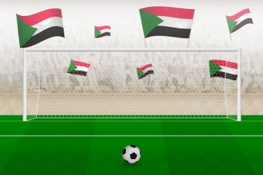 Sudan futbol takımının taraftarları stadyumda bayrak sallıyor, futbol maçında penaltı vuruşu kavramı.