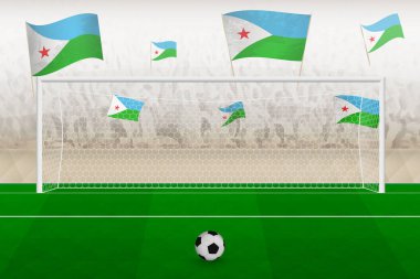 Cibuti futbol takımının taraftarları stadyumda Cibuti bayraklarıyla tezahürat yapıyor, futbol maçında penaltı konsepti.