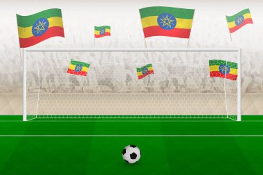 Etiyopya futbol takımının taraftarları stadyumda Etiyopya bayrakları ile tezahürat yapıyor, futbol maçında penaltı konsepti.