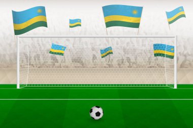 Ruanda futbol takımı taraftarları Ruanda bayraklarıyla stadyumda tezahürat yapıyor, futbol maçında penaltı konsepti.